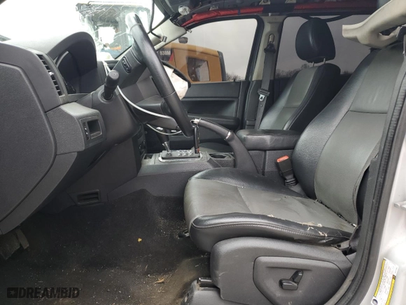 2009 Jeep Grand Cherokee Laredo with VIN 1J8GR48K89C522896, listed as a Copart auction lot 51656265 with 211,359 mi miles and Salvage Title. Bid and sale history available at carsss.com. Image 7.