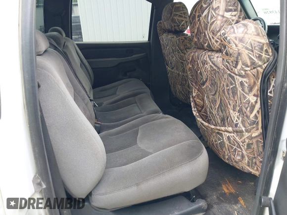 2005 GMC Sierra 2500HD SLE z VIN 1GTHK23U75F804162, wystawiony jako IAAI lot #42143820 z przebiegiem 3 mil mil oraz . Historia ofert i sprzedaży dostępna na DreamBid. Obrazek 8.