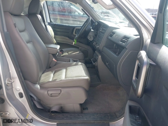 2014 Honda Ridgeline RTL with VIN 5FPYK1F51EB012843, listed as a IAAI auction lot 41629002 with 114,761 mi miles. Bid and sale history available at carsss.com. Image 5.