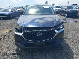 2021 Mazda CX-30 Select with VIN 3MVDMBBL6MM243726, listed as a IAAI auction lot 42353943 with 67,239 mi miles and . Bid and sale history available at DreamBid. Image 13.