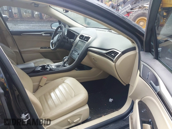 2015 Ford Fusion SE Hybrid with VIN 3FA6P0LU5FR190333, listed as a IAAI auction lot 41802327 with 256,747 mi miles. Bid and sale history available at carsss.com. Image 5.