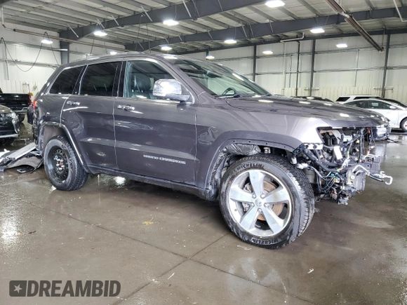 2016 Jeep Grand Cherokee Overland with VIN 1C4RJFCG9GC345309, listed as a Copart auction lot 61095285 with 115,968 mi miles and Salvage title. Bid and sale history available at DreamBid. Image 4.