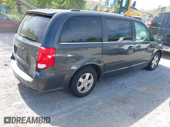 2011 Dodge Grand Caravan Crew with VIN 2D4RN5DG1BR790613, listed as a IAAI auction lot 42106380 with 188,528 mi miles and . Bid and sale history available at DreamBid. Image 4.