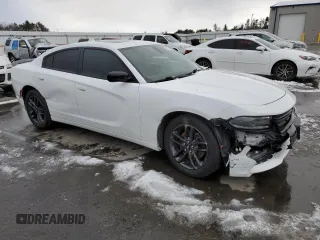 2019 Dodge Charger SXT with VIN 2C3CDXJG6KH730441, listed as a Copart auction lot 87877955 with 50,892 mi miles and Salvage Title. Bid and sale history available at DreamBid. Image 4.
