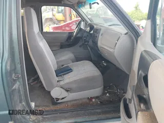 1996 Ford Ranger XL z VIN 1FTCR14AXTTA10663, wystawiony jako IAAI lot #42312413 z przebiegiem 104 211 mil mil oraz . Historia ofert i sprzedaży dostępna na DreamBid. Obrazek 5.