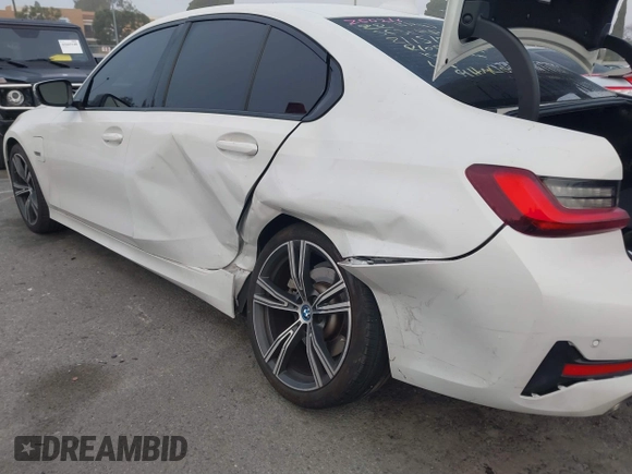 2022 BMW 3 Series 330e with VIN 3MW5P7J04N8C40865, listed as a IAAI auction lot 41635704 with 44,929 mi miles. Bid and sale history available at carsss.com. Image 6.