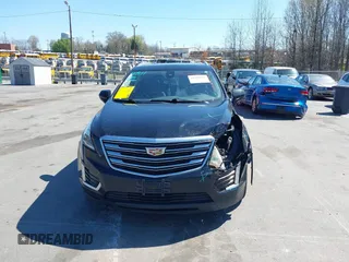 2017 Cadillac XT5 Luxury AWD z VIN 1GYKNDRS6HZ325727, wystawiony jako IAAI lot #41900538 z przebiegiem 132 375 mil mil oraz . Historia ofert i sprzedaży dostępna na DreamBid. Obrazek 12.