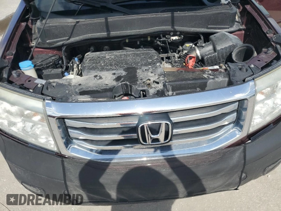 2013 Honda Pilot EX-L с VIN 5FNYF3H58DB044788, выставлен на аукционе Copart как лот 60202325 с пробегом Не указан миль и Списание • Salvage title. История ставок и продаж доступна на DreamBid. Изображение 12.