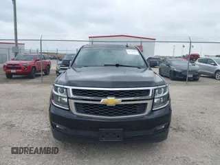 2016 Chevrolet Suburban LT with VIN 1GNSKHKC4GR233059, listed as a IAAI auction lot 42137869 with 115,571 mi miles. Bid and sale history available at carsss.com. Image 12.
