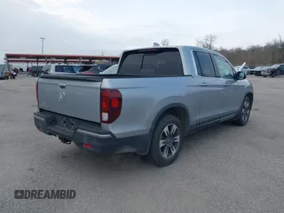 2019 Honda Ridgeline RTL with VIN 5FPYK2F50KB004055, listed as a IAAI auction lot 41576975 with 128,620 mi miles and . Bid and sale history available at DreamBid. Image 4.