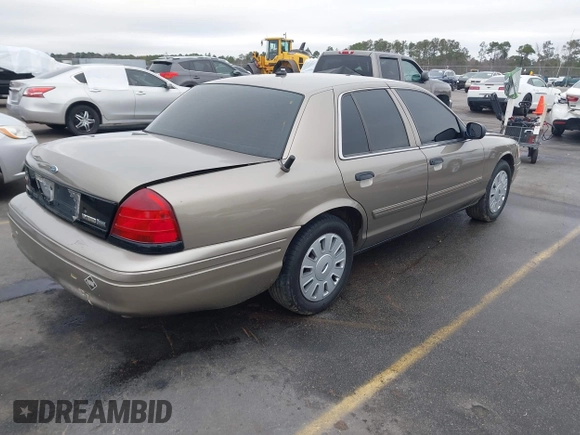 2009 Ford Police Interceptor with VIN 2FAHP71V39X123653, listed as a IAAI auction lot 41538732 with 306,400 mi miles and . Bid and sale history available at DreamBid. Image 4.