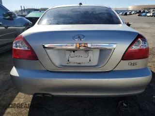 2003 Infiniti Q45 z VIN JNKBF01AX3M103002, wystawiony jako Copart lot #47860175 z przebiegiem 317 912 mil mil oraz Tytuł czysty. Historia ofert i sprzedaży dostępna na DreamBid. Obrazek 6.
