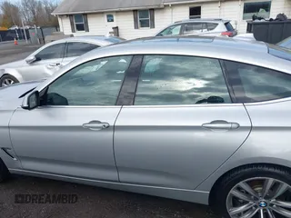 2016 BMW 3 Series 328i Gran Turismo xDrive z VIN WBA8Z5C52GG500852, wystawiony jako IAAI lot #41764251 z przebiegiem 96 176 mil mil oraz . Historia ofert i sprzedaży dostępna na DreamBid. Obrazek 14.