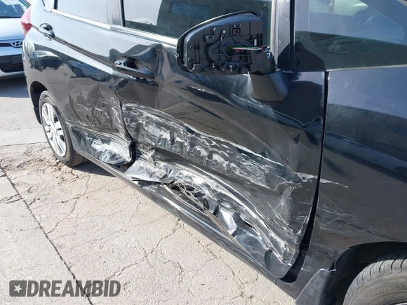 2015 Honda Fit LX with VIN 3HGGK5G5XFM737172, listed as a IAAI auction lot 42053332 with 80,690 mi miles. Bid and sale history available at carsss.com. Image 6.