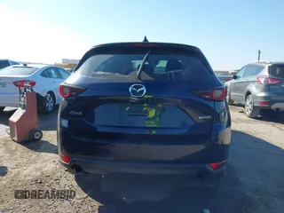 2017 Mazda CX-5 Touring with VIN JM3KFACL1H0192549, listed as a IAAI auction lot 41667781 with 89,030 mi miles. Bid and sale history available at carsss.com. Image 16.