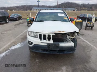 2016 Jeep Compass Sport with VIN 1C4NJDBB5GD804581, listed as a IAAI auction lot 41502976 with 196,351 mi miles and . Bid and sale history available at carsss.com. Image 12.