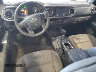 2018 Toyota Tacoma SR z VIN 3TMCZ5AN2JM122416, wystawiony jako Copart lot #41620015 z przebiegiem Nie podano mil oraz Szkoda całkowita • Salvage title. Historia ofert i sprzedaży dostępna na DreamBid. Obrazek 8.