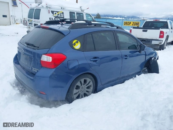 2013 Subaru Impreza Wagon 2.0i Sport Premium with VIN JF1GPAL64D2826558, listed as a IAAI auction lot 41561266 with 148,059 mi miles. Bid and sale history available at carsss.com. Image 4.