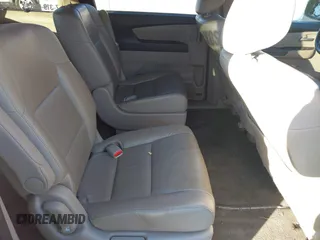 2012 Honda Odyssey Touring z VIN 5FNRL5H9XCB067841, wystawiony jako IAAI lot #40631672 z przebiegiem 210 237 mil mil oraz . Historia ofert i sprzedaży dostępna na DreamBid. Obrazek 8.