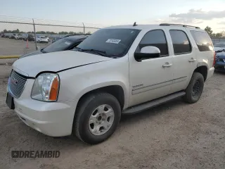 2012 GMC Yukon SLT with VIN 1GKS1CE03CR287810, listed as a Copart auction lot 73743304 with 206,122 mi miles and Salvage Title. Bid and sale history available at carsss.com. Image 1.