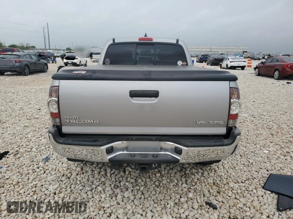 2014 Toyota Tacoma with VIN 3TMMU4FN0EM072840, listed as a Copart auction lot 51740805 with 128,678 mi miles and Salvage title. Bid and sale history available at DreamBid. Image 6.