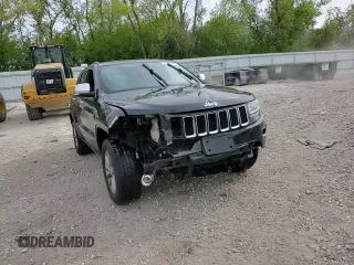 2014 Jeep Grand Cherokee Limited z VIN 1C4RJFBG4EC294770, wystawiony jako Copart lot #57468985 z przebiegiem 190 989 mil mil oraz Szkoda całkowita • Salvage title. Historia ofert i sprzedaży dostępna na DreamBid. Obrazek 13.