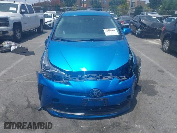 2021 Toyota Prius L Eco with VIN JTDKAMFUXM3134462, listed as a IAAI auction lot 42450931 with 89,239 mi miles and . Bid and sale history available at DreamBid. Image 12.