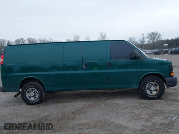 2014 Chevrolet Express Cargo Van with VIN 1GCWGGCAXE1198199, listed as a IAAI auction lot 41242821 with 274,446 mi miles. Bid and sale history available at carsss.com. Image 13.
