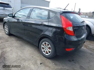 2013 Hyundai Accent GL with VIN KMHCT5AE9DU084356, listed as a IAAI auction lot 41817130 with 114,455 mi miles. Bid and sale history available at carsss.com. Image 3.