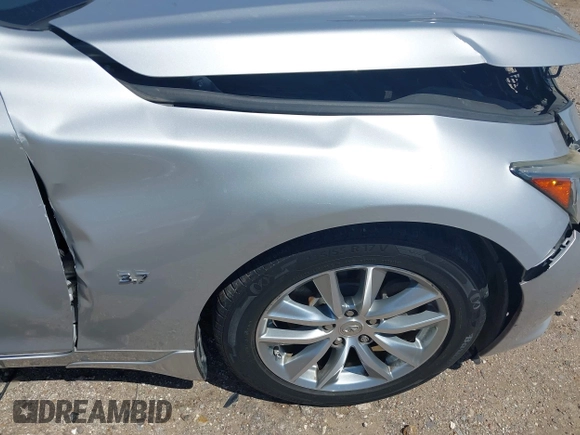 2015 Infiniti Q50 with VIN JN1BV7AR3FM405659, listed as a IAAI auction lot 41949596 with 101,196 mi miles and . Bid and sale history available at DreamBid. Image 17.