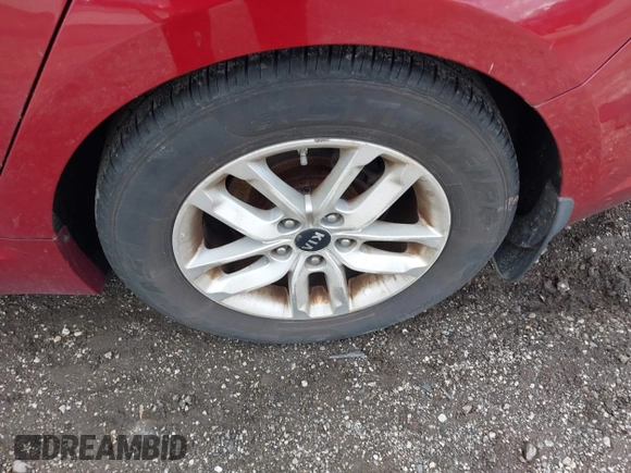 2011 Kia Optima LX z VIN KNAGM4A75B5168564, wystawiony jako IAAI lot #42301373 z przebiegiem Nie podano mil oraz . Historia ofert i sprzedaży dostępna na DreamBid. Obrazek 12.
