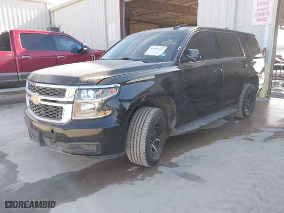 2018 Chevrolet Tahoe Commercial with VIN 1GNSKDEC8JR351269, listed as a IAAI auction lot 41602443 with 79,970 mi miles. Bid and sale history available at carsss.com. Image 2.