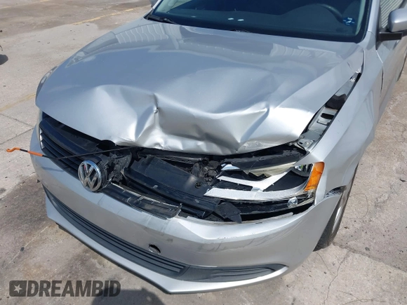 2012 Volkswagen Jetta Sedan SE w/Convenience with VIN 3VWDX7AJ1CM401939, listed as a IAAI auction lot 41941070 with 123,611 mi miles. Bid and sale history available at carsss.com. Image 6.