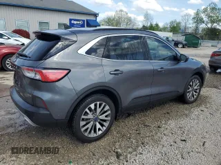 2021 Ford Escape Titanium Hybrid z VIN 1FMCU9DZ4MUA56645, wystawiony jako Copart lot #54059515 z przebiegiem 31 432 mil mil oraz Szkoda całkowita • Salvage title. Historia ofert i sprzedaży dostępna na DreamBid. Obrazek 3.