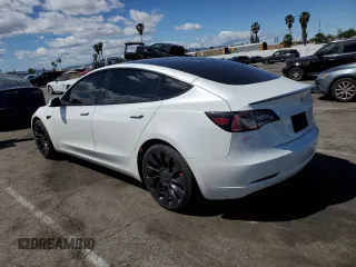 2022 Tesla Model 3 Performance with VIN 5YJ3E1EC7NF248083, listed as a Copart auction lot 51536925 with 50,529 mi miles and Salvage Title. Bid and sale history available at DreamBid. Image 2.