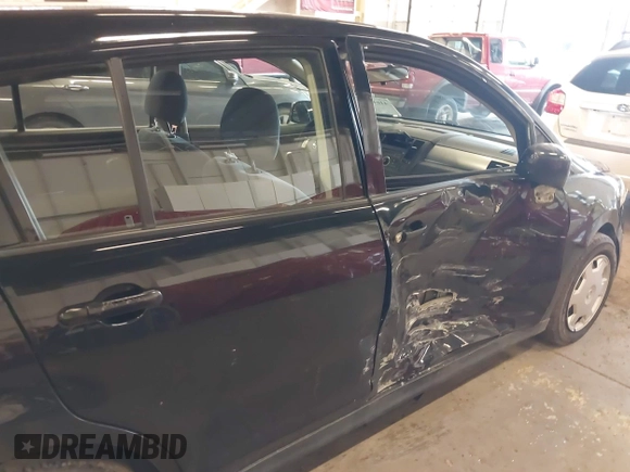 2009 Nissan Versa 1.8 S with VIN 3N1BC13E39L415491, listed as a IAAI auction lot 41614914 with 104,795 mi miles. Bid and sale history available at carsss.com. Image 6.