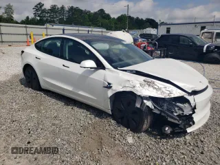 2025 Tesla Model 3 Long Range with VIN 5YJ3E1EA3SF889774, listed as a Copart auction lot 57493425 with 5,167 mi miles and Salvage title. Bid and sale history available at DreamBid. Image 4.