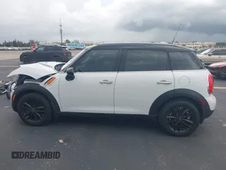 2012 MINI Countryman z VIN WMWZB3C56CWM04087, wystawiony jako IAAI lot #42180040 z przebiegiem 37 789 mil mil oraz . Historia ofert i sprzedaży dostępna na DreamBid. Obrazek 15.