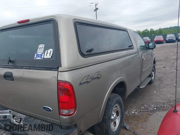 2001 Ford F-150 XL with VIN 1FTRF18W11NA61110, listed as a IAAI auction lot 42288546 with Not provided miles and . Bid and sale history available at DreamBid. Image 4.