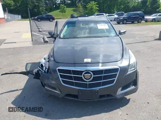 2014 Cadillac CTS Luxury AWD z VIN 1G6AX5SX7E0173466, wystawiony jako IAAI lot #42187266 z przebiegiem 115 140 mil mil oraz . Historia ofert i sprzedaży dostępna na DreamBid. Obrazek 11.