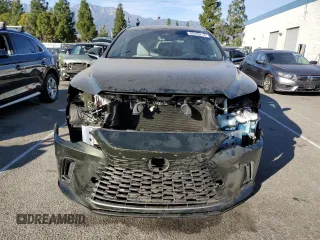 2023 Lexus RX with VIN JTJCHMAA0P2001696, listed as a Copart auction lot 85546714 with 10,798 mi miles and Salvage Title. Bid and sale history available at carsss.com. Image 5.