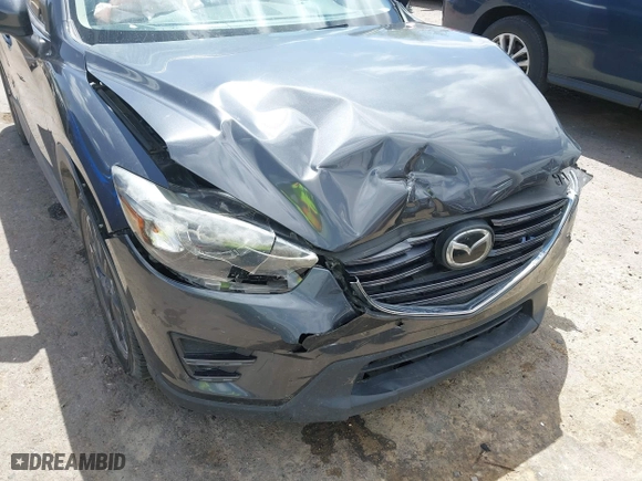 2016 Mazda CX-5 Grand Touring with VIN JM3KE4DY7G0643643, listed as a IAAI auction lot 42077497 with 120,343 mi miles. Bid and sale history available at carsss.com. Image 17.