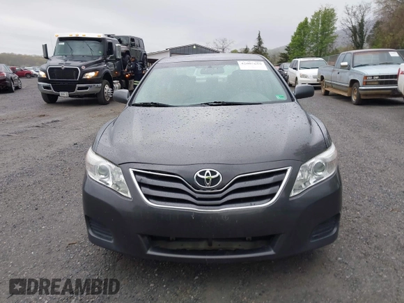 2011 Toyota Camry LE with VIN 4T1BF3EKXBU719590, listed as a IAAI auction lot 42007659 with 232,349 mi miles and . Bid and sale history available at DreamBid. Image 12.