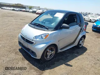 2013 Smart fortwo Pure with VIN WMEEJ3BA8DK619600, listed as a IAAI auction lot 42660006 with Not provided miles and . Bid and sale history available at DreamBid. Image 2.