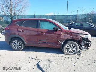 2020 Hyundai Tucson Value with VIN KM8J3CA42LU149811, listed as a IAAI auction lot 41642255 with 60,936 mi miles. Bid and sale history available at carsss.com. Image 12.