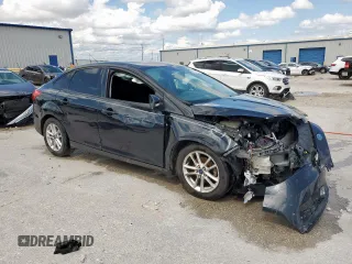 2015 Ford Focus SE with VIN 1FADP3F23FL242768, listed as a Copart auction lot 58068865 with 172,163 mi miles and Salvage title. Bid and sale history available at DreamBid. Image 4.