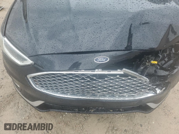 2019 Ford Fusion Titanium with VIN 3FA6P0K9XKR217324, listed as a Copart auction lot 56104185 with 135,728 mi miles and Salvage title. Bid and sale history available at DreamBid. Image 12.