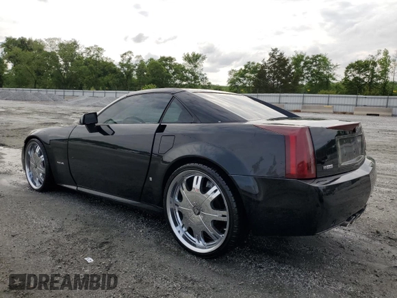 2006 Cadillac XLR z VIN 1G6YV36A265600782, wystawiony jako Copart lot #54352705 z przebiegiem 94 678 mil mil oraz Szkody całkowita. Historia ofert i sprzedaży dostępna na DreamBid. Obrazek 2.