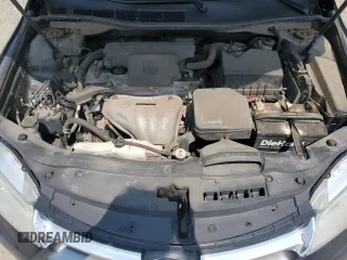 2017 Toyota Camry XLE z VIN 4T1BF1FK6HU323944, wystawiony jako Copart lot #59300195 z przebiegiem 190 469 mil mil oraz Szkoda całkowita • Salvage title. Historia ofert i sprzedaży dostępna na DreamBid. Obrazek 11.