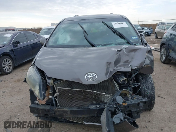 2015 Toyota Sienna SE with VIN 5TDXK3DC8FS652966, listed as a IAAI auction lot 41576611 with 108,858 mi miles and . Bid and sale history available at DreamBid. Image 12.